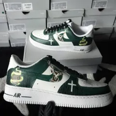 The inner side of the Jägermeister custom sneakers. This view shows the continuation of the design, featuring the brand's iconic stag and cross emblem, ensuring a complete 360-degree artwork.