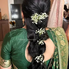A subtle and elegant mermaid braid, created without any hair extensions. This style is perfect for showing off natural hair length and volume.