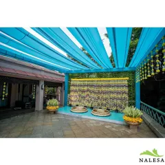 A vibrant Haldi ceremony setup. I used a bright blue canopy to contrast beautifully with the traditional yellow marigold decor, creating a fresh and modern take on the classic Haldi theme.