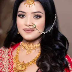 Another angle of this stunning student work. The focus is on flawless skin and beautifully blended makeup.