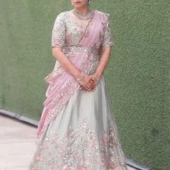 This full-length shot shows how the complete look comes together. The makeup, hair, and outfit are in perfect harmony, creating an elegant and graceful silhouette for her special event.