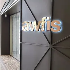 The backlit logo detail on the Awfis pod highlights the premium finish. My automation systems are designed to complement and enhance the interior design of any commercial space.