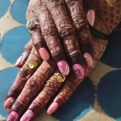How cute is this baby shower nail art? I hand-painted little dress and butterfly designs to celebrate the mom-to-be. These special occasion sets are so much fun to create and add a personal touch to the celebration.