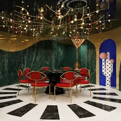 We believe design should also be fun. This dramatic dining space from our "Whimsy Wonder" project showcases our love for maximalism, with a theatrical chandelier, bold colors, and quirky art creating an unforgettable, immersive experience.