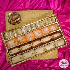This premium mithai box features some of my most loved Bengali sweets. The elegant gold packaging makes it a stunning gift for clients, partners, or loved ones.