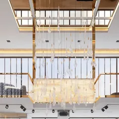 A magnificent custom chandelier with cascading glass elements, designed as the centerpiece for a double-height living space.