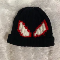 Here is a detailed shot of the crochet Spiderman beanie. I focus on getting the details right, like the shape and outline of the eyes, to make it instantly recognizable.
