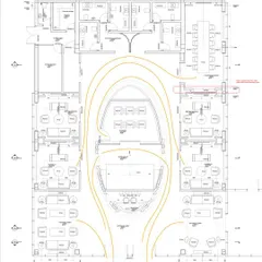 This floor plan of the Godrej South Estate Experience Centre illustrates our strategic approach to spatial narrative. The yellow lines show the intended visitor flow, a seamless journey that moves from the grand entrance through various zones like the AV room, model display, and discussion lounges, ensuring a cohesive and impactful experience.