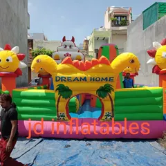 This 18x18 foot "Dream Home" bounce house is a great example of a combo unit. It features tunnels, pop-up obstacles, and a slide, all made with SRF 560 gsm PVC fabric.
