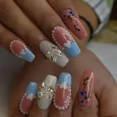 A delicate and romantic design with a mix of pastel blue and pink, featuring pearl borders, tiny hearts, and a stunning 3D bow made of crystals.