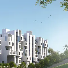 This view of Aurum Avenue shows the building set within a green landscape, emphasizing our commitment to integrating nature into high-density urban projects. The architecture's white, sculptural form stands out against the blue sky and surrounding trees.