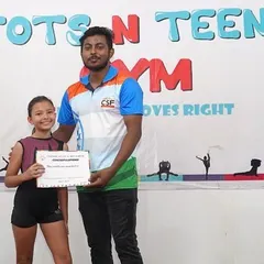 A proud moment for one of our gymnasts receiving her Level 1 certification from her coach. These milestones are so important for building confidence and recognizing progress.