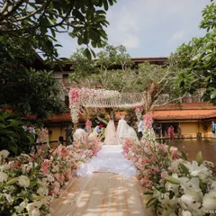 In the soulful landscape of Sri Lanka, we designed a floral aisle that appears to float over water, leading to a mandap nestled among the trees. This is how we believe destination weddings should feel: effortless, breathtaking, and perfectly integrated with the natural beauty of the location.