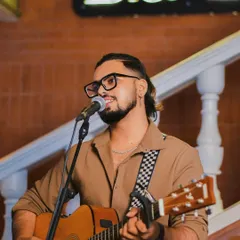 A close up from a live solo show. You can see the passion I have for my craft. I am focused on delivering a great vocal performance while connecting with the audience.