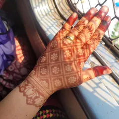 Here is a beautiful, mature henna stain captured in natural light. This rich, reddish-brown color is the result of using high-quality, natural henna and following the proper aftercare steps.