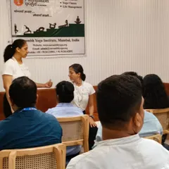 Our instructors leading a corporate yoga session at Connekt in Andheri East. We begin by teaching simple stretches that can be done at a desk to relieve neck and shoulder tension from long hours of sitting.