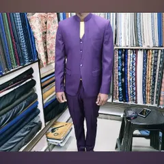 A complete Jodhpuri suit in a striking purple color, tailored for a client in my shop. This is a perfect outfit for a wedding sangeet or reception.