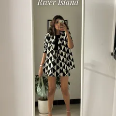 This geometric print blazer and shorts set is another one of my favorites. It's a bold, graphic look that is perfect for making a statement.