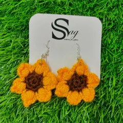 My handmade sunflower earrings, ready to be shipped. They are a popular choice for a bohemian, nature-inspired accessory.