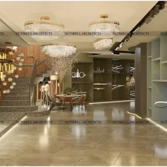 We designed the showroom with distinct zones to display different styles of lighting. This area features a grand staircase and showcases a range of contemporary and classic chandeliers and pendant lights.