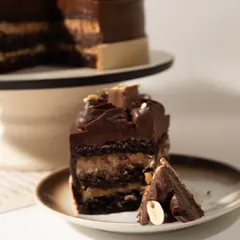 Just look at those layers. Taking a bite of my Snickers cake is an experience in texture and flavor, with the perfect balance of sweet, salty, and nutty.