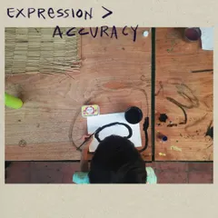 Expression over accuracy. This little artist is completely absorbed in their work, a perfect example of how we prioritize a child's unique expression above all else.