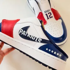 This detail shot shows the custom "Patriots" logo I painted inside the Nike swoosh, along with six stars on the heel to represent the team's six championship wins.