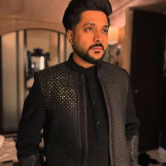 A thoughtful pose. The details on this jacket are just as intricate as the notes in a song.