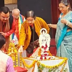 The ceremonial lighting of the lamp to inaugurate the music competition. It is important to begin such events by seeking divine blessings.