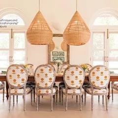 For this Spanish-inspired villa in Goa, the dining room is the heart of the home. I designed these oversized cane light fixtures and had them custom-made by local Goan artisans, bringing a piece of the region's craft heritage right to the dinner table.