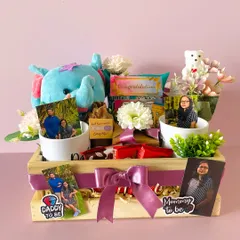 The parents-to-be hamper is personalized with "Mommy to be" and "Daddy to be" stickers and photos, celebrating their new journey together.