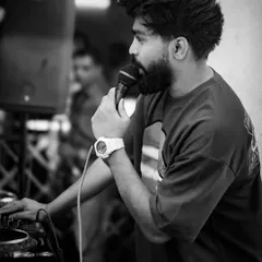 A black and white shot of me on the mic. I believe a DJ should be a performer, interacting with the crowd and being a visible part of the party's energy.