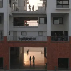 At the Srishti Manipal Institute, we designed the campus with non-hierarchical layers. This view through a portal captures the essence of the space, where students can interact across different levels, fostering a sense of community and shared journey.