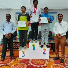 Another angle of our students' victory, celebrating their achievement on the podium. This is a testament to their hard work and our competitive training program.