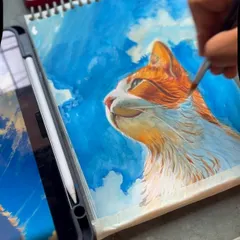 Adding more details to the cat's fur and the clouds in the background. Watercolor allows for beautiful, soft layers.