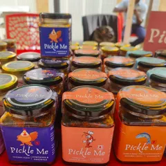 A colourful display of our top non-veg pickles. You can see our Chicken Lickin' pickle, Prawn Balchao, and the Something's Fishy Bombay Duck pickle, all ready to spice up your meals.