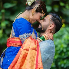 A moment of pure joy and connection. We love capturing these unscripted, happy lifts that show the couple's personality, like this one from a beautiful Maharashtrian wedding.