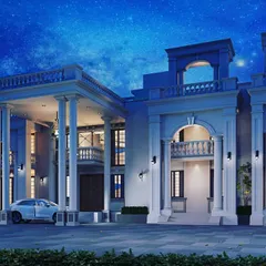 A dramatic night view of the same classical residential building. The architectural lighting is designed to accentuate the majestic columns and arched openings, creating a powerful and opulent statement.
