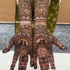 A stunning example of symmetrical peacock designs, a classic choice for Indian wedding mehendi that symbolizes grace and beauty.