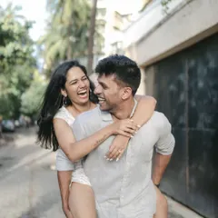 A pre-wedding shoot should be filled with your genuine energy. We captured this spontaneous, joyful piggyback ride to reflect the couple's playful and carefree connection.