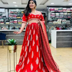 Day 6 of Navratri celebrated with this beautiful red Anarkali-style lehenga. The silver work on the red velvet fabric gives it a very royal and festive look.