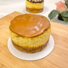 Our eggless Baked Biscoff New York Cheesecake. It has a crunchy Biscoff base, a creamy baked cheesecake filling, and is topped with a generous layer of smooth Biscoff spread.