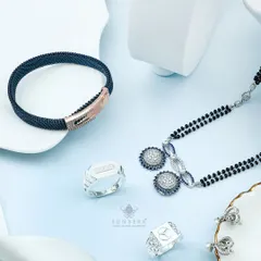 This collection highlights our men's and women's silver jewellery. It features a men's mesh bracelet, statement rings, and a modern mangalsutra, showcasing pieces crafted to perfection.