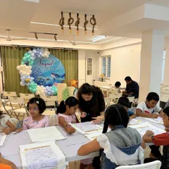 An "Under The Sea" themed birthday party in full swing. The decorations and art activity were perfectly coordinated for the birthday boy's special day.
