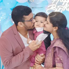 Kisses for the birthday boy! We focus on capturing the love and affection surrounding the little one on their first birthday.