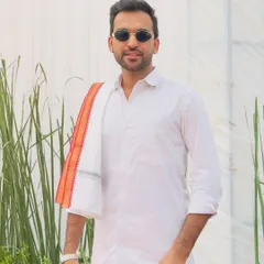 For a South Indian themed event, the entry has to be impactful. Dressed in a traditional veshti, I bring that authentic 'mass hero' swag to the party right from the start.