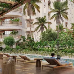 An idyllic retreat that captures the serene charm of tropical elegance. This outdoor oasis, with its cozy deck seating, sparkling pool, and lush greenery, offers the perfect escape to unwind and rejuvenate.