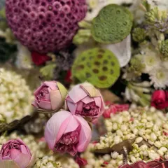 A close-up of my favorite traditional flowers for Diwali. The delicate pink lotus buds nestled among fragrant white mogra and lotus pods create a display that is both beautiful and deeply symbolic.