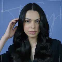 A closer look at the soft waves, showcasing the healthy shine and seamless blend of layers. Our styling focuses on creating looks that are not only beautiful but also maintain the integrity and health of your hair.