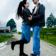 A fun and romantic pose that shows the couple's chemistry. Pre-wedding shoots are all about capturing your natural interactions.